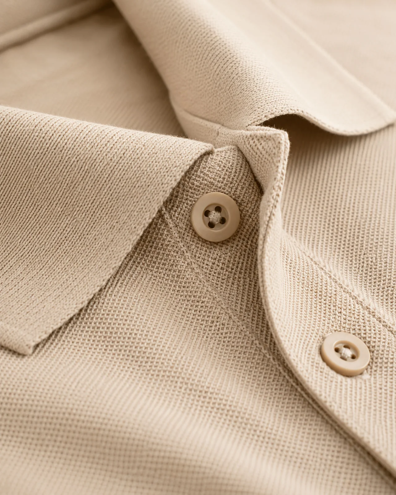 Close-up of a polo shirt's fabric, stitching and collar